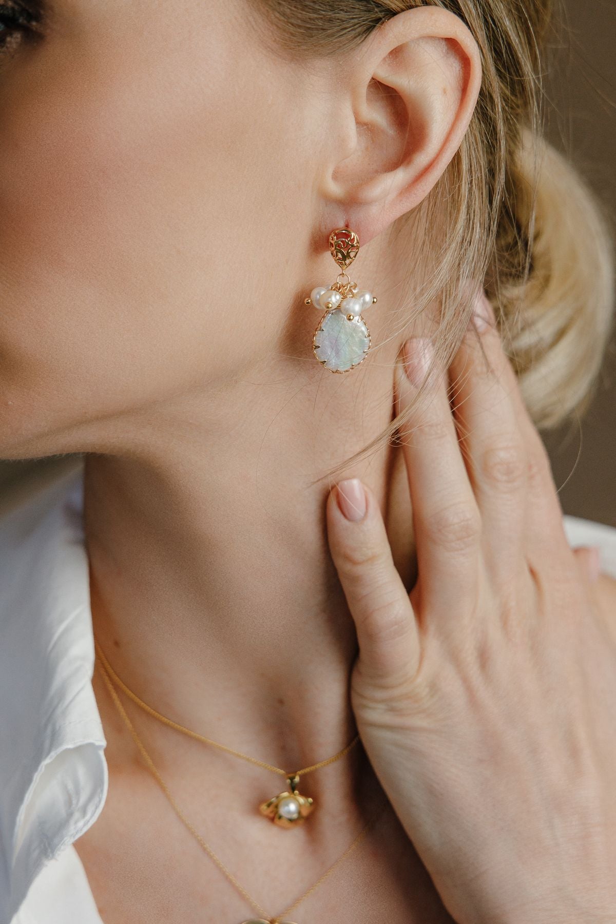 Extravagant earrings with pearls made of 925 silver gold-plated