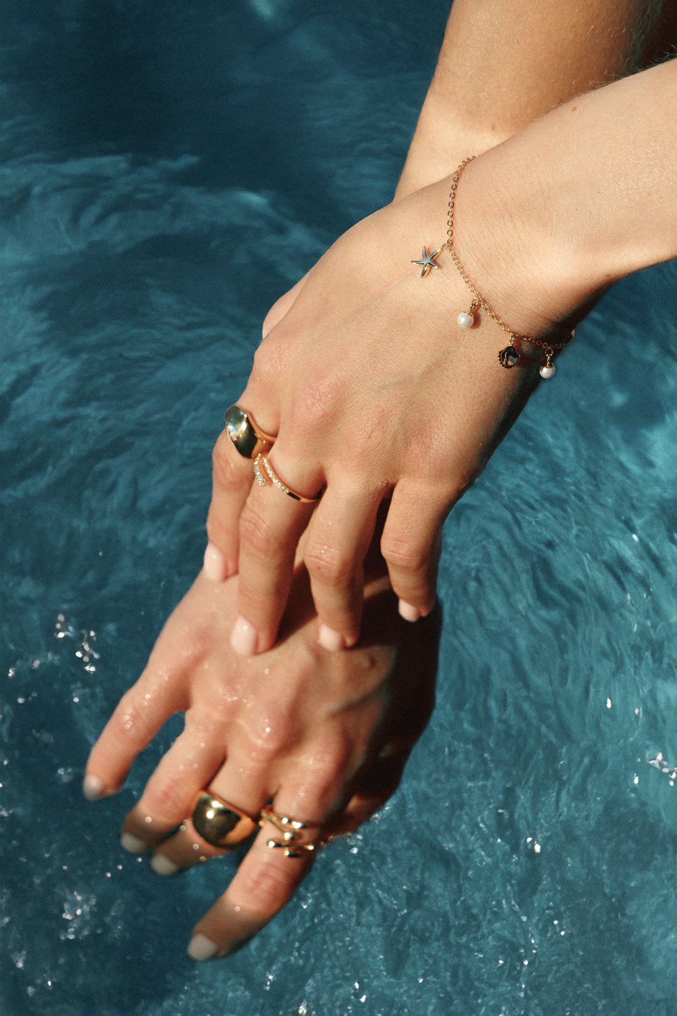 Armkette „Lost in the sea“ - Seestern, Perle und Muscheln - 925 Silber 14K vergoldet