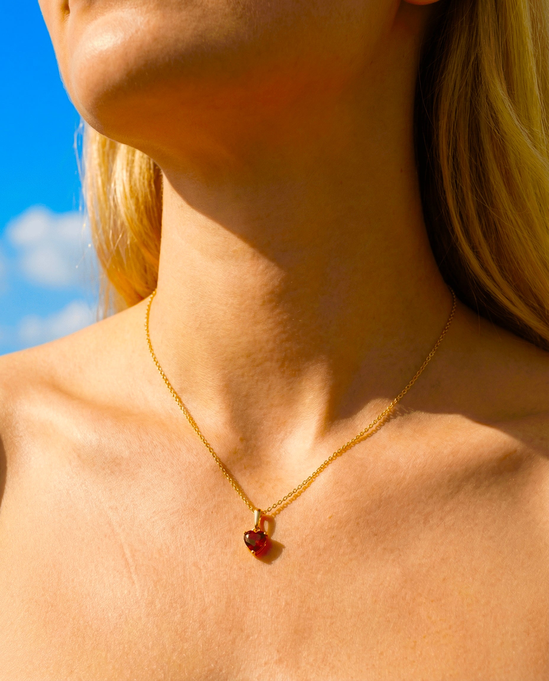 585 gold timeless jewelry set “One True Love” heart necklace with red cubic zirconia and heart stud earrings