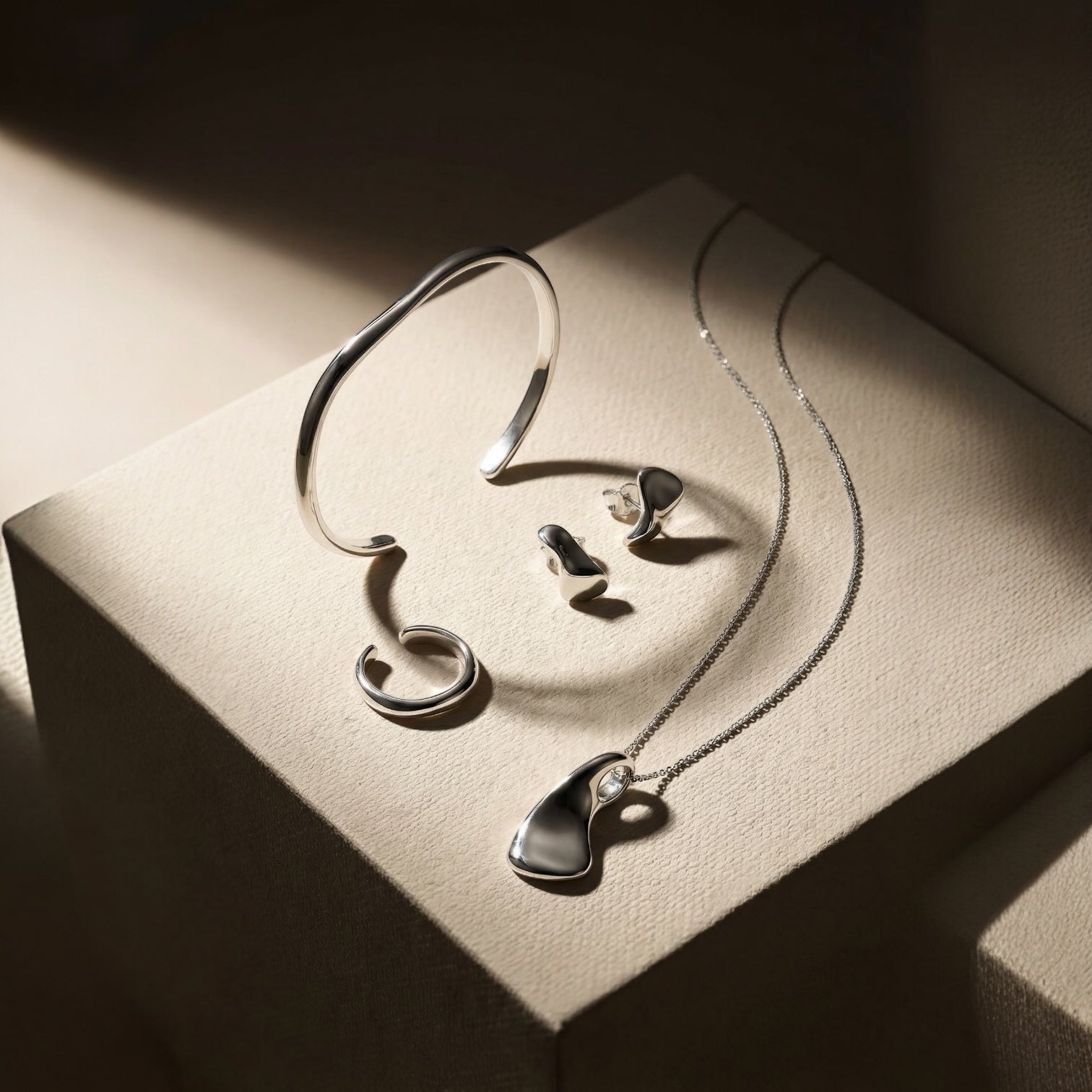 Sculptural Fluid Set - Substanziell aus 925 Silber - NINASIA