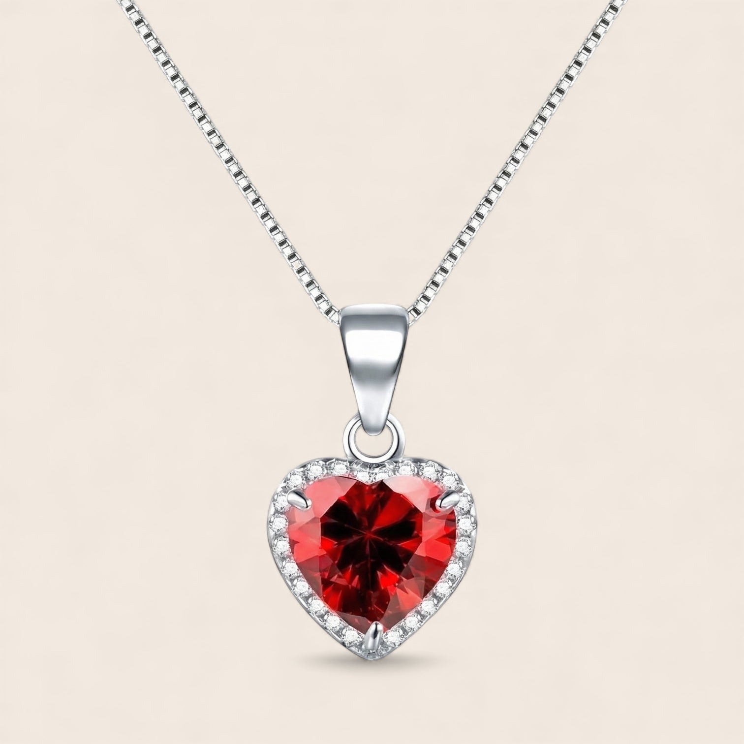 Elegant heart-shaped necklace with red gemstone, made of 925 silver