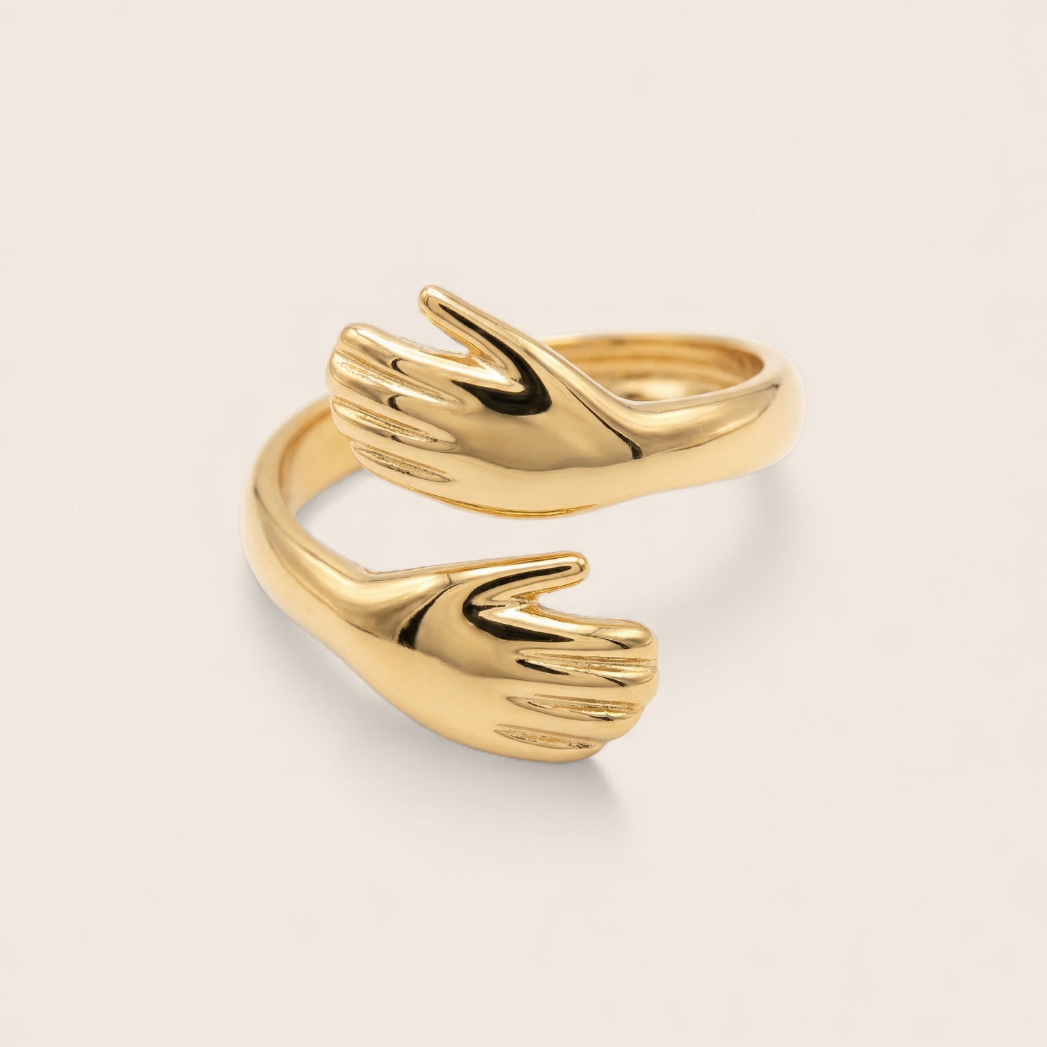 Embracing Hands Ring made of stainless steel gold-plated