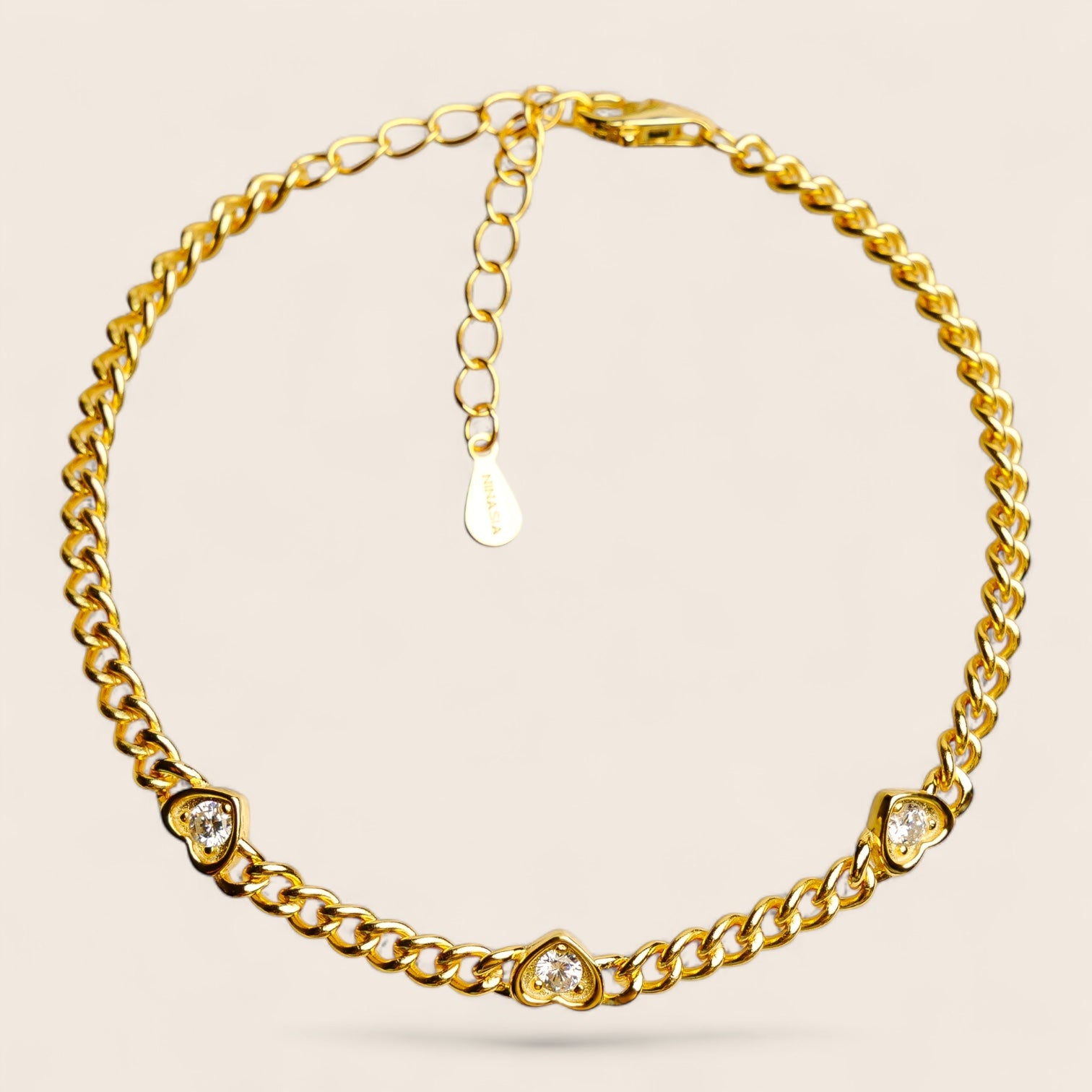 ENDLESS LOVE – Curb chain bracelet with heart-shaped zirconias, made of 925 silver 18K gold-plated