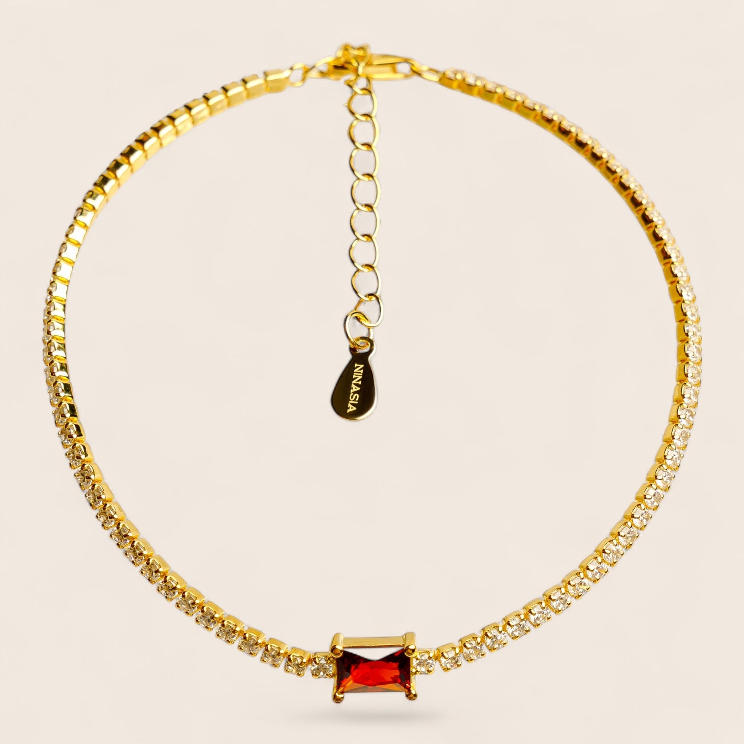 RUBY – sparkling bracelet with white zirconias and a central wine-red highlight, made of 925 silver 18K gold-plated