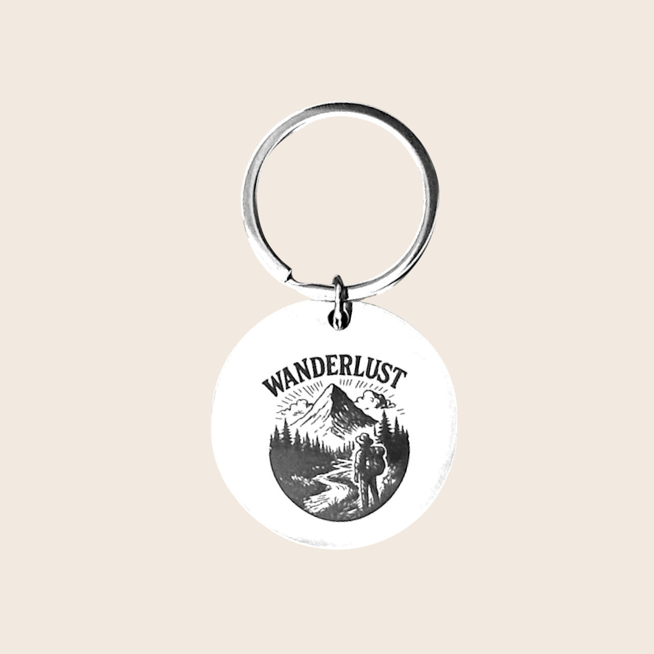 Personalized round stainless steel keychain with engraving – Wanderlust