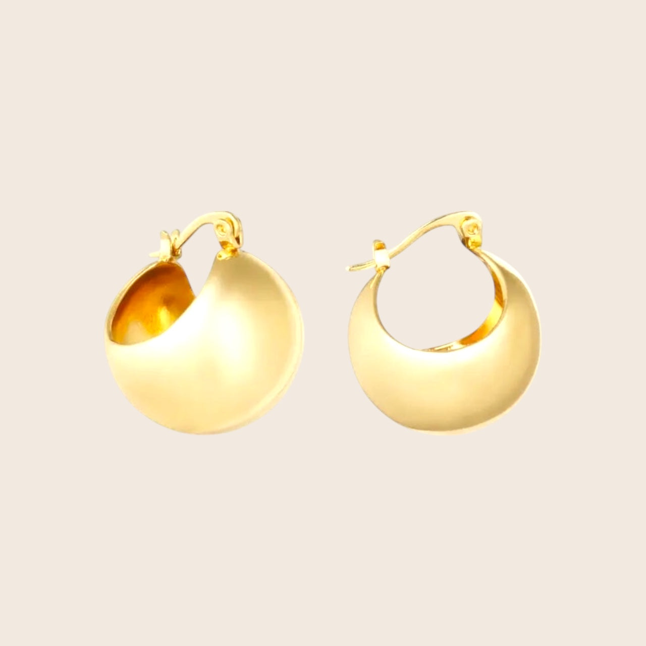 Statement ball earrings made of gold-colored stainless steel