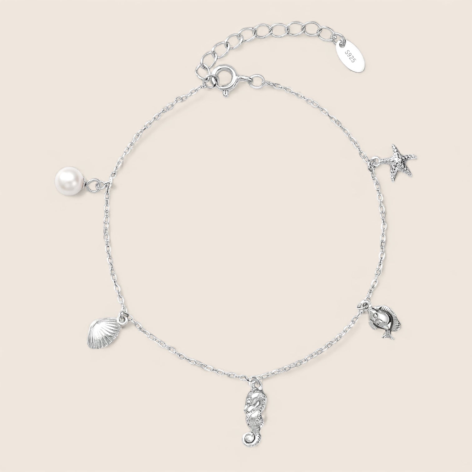 Armkette „Inspired by the Sea“ – Seestern, Süßwasserperle und Muschel – 925 Silber 14K vergoldet